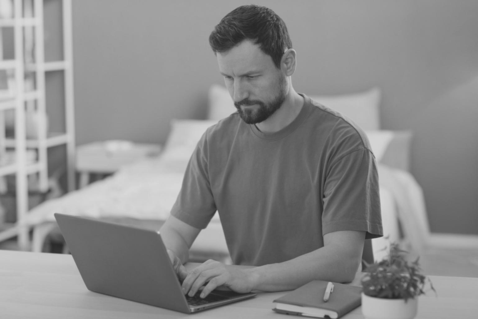Person planning their learning schedule with calendar and materials